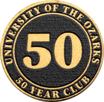 Circular lapel pin for University of the Ozarks 50 Year Club featuring a textured black background with gold number 50 and raised gold lettering.