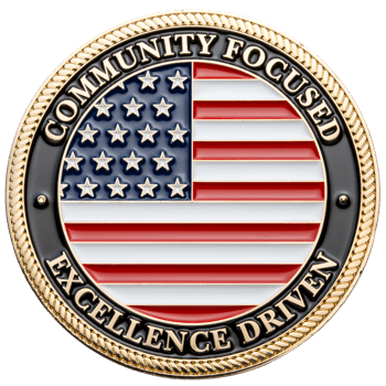 Circular challenge coin featuring a central American flag design, black outer border with gold text, and a rope-textured edge.