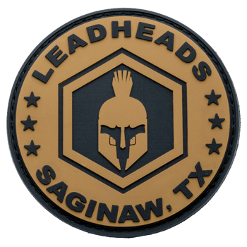 Round PVC patch featuring a Spartan helmet logo for Leadheads in Saginaw, TX, with black and tan colors.
