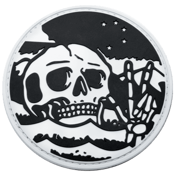 Circular PVC patch featuring a black and white skull design with skeletal fingers and stars.
