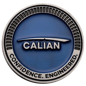 Calian challenge coin with a blue enamel center, silver logo, and 'Confidence. Engineered.' text around the border.