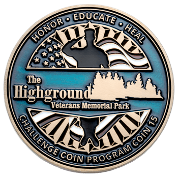 Circular challenge coin featuring a saluting soldier silhouette, American flag, and tree line with text for The Highground Veterans Memorial Park.