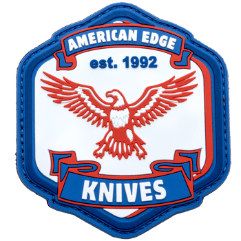 Shield-shaped PVC patch featuring a red eagle, the text American Edge Knives, and est. 1992 in a blue, white, and red color scheme.