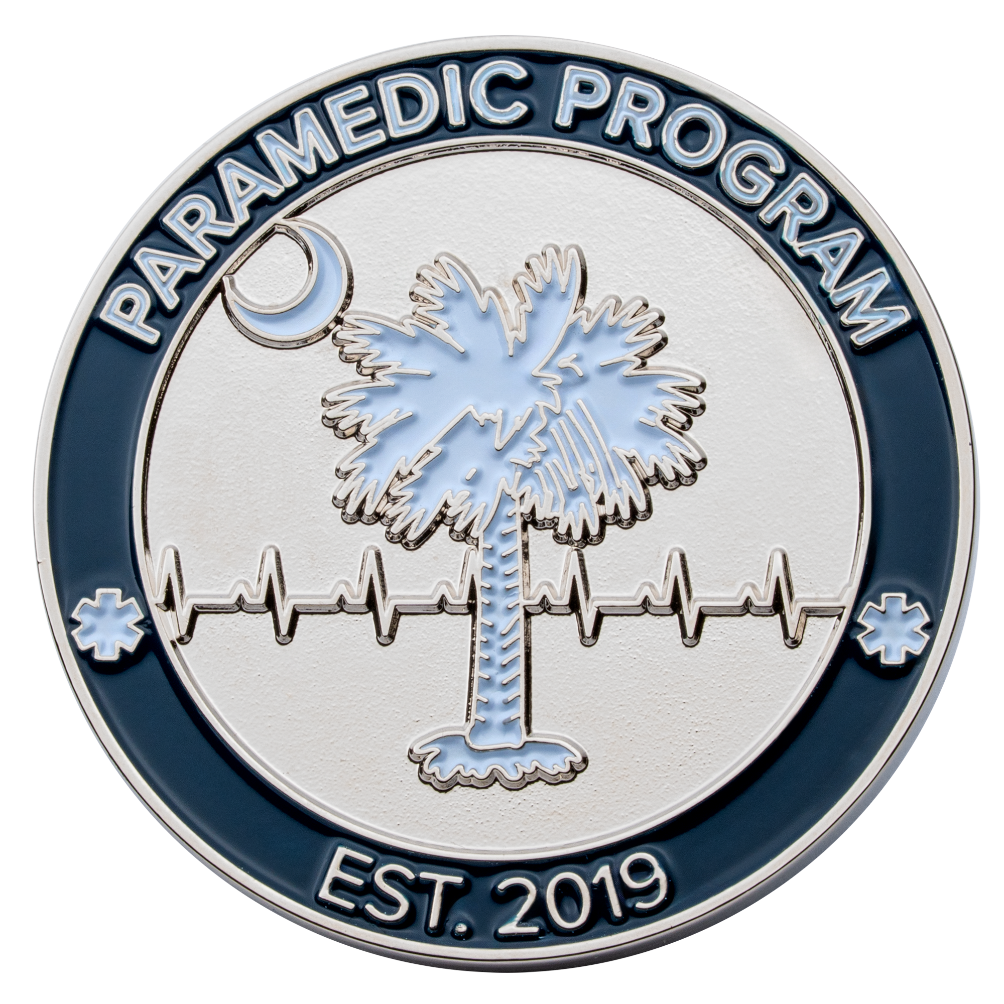 Circular challenge coin featuring a palmetto tree, crescent moon, and EKG line for a Paramedic Program established in 2019.