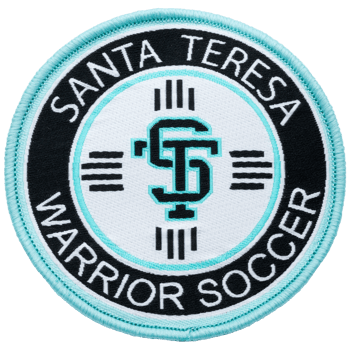 Circular embroidered patch for Santa Teresa Warrior Soccer featuring a central ST monogram with a light blue and black color scheme.