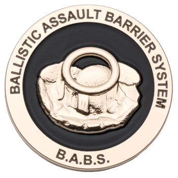 Gold and black challenge coin featuring the Ballistic Assault Barrier System (B.A.B.S.) text and a 3D embossed barrier design.