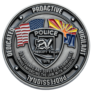 Silver-toned Prescott Valley Police challenge coin featuring the American flag, Arizona flag, and police shield emblem with 1978 date.