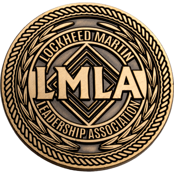 Antiqued gold Lockheed Martin Leadership Association challenge coin with LMLA logo and laurel wreath border.