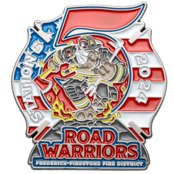 Custom shield-shaped challenge coin featuring a rhino firefighter, American flag background, and text reading Road Warriors Station 5 2024.