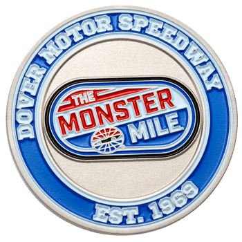 Circular challenge coin for Dover Motor Speedway featuring The Monster Mile logo in red, white, and blue enamel.