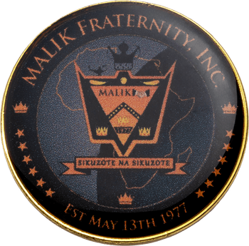 Malik Fraternity Inc. round challenge coin with fraternity crest, African continent outline, and Est May 13th 1977 text on a black background.