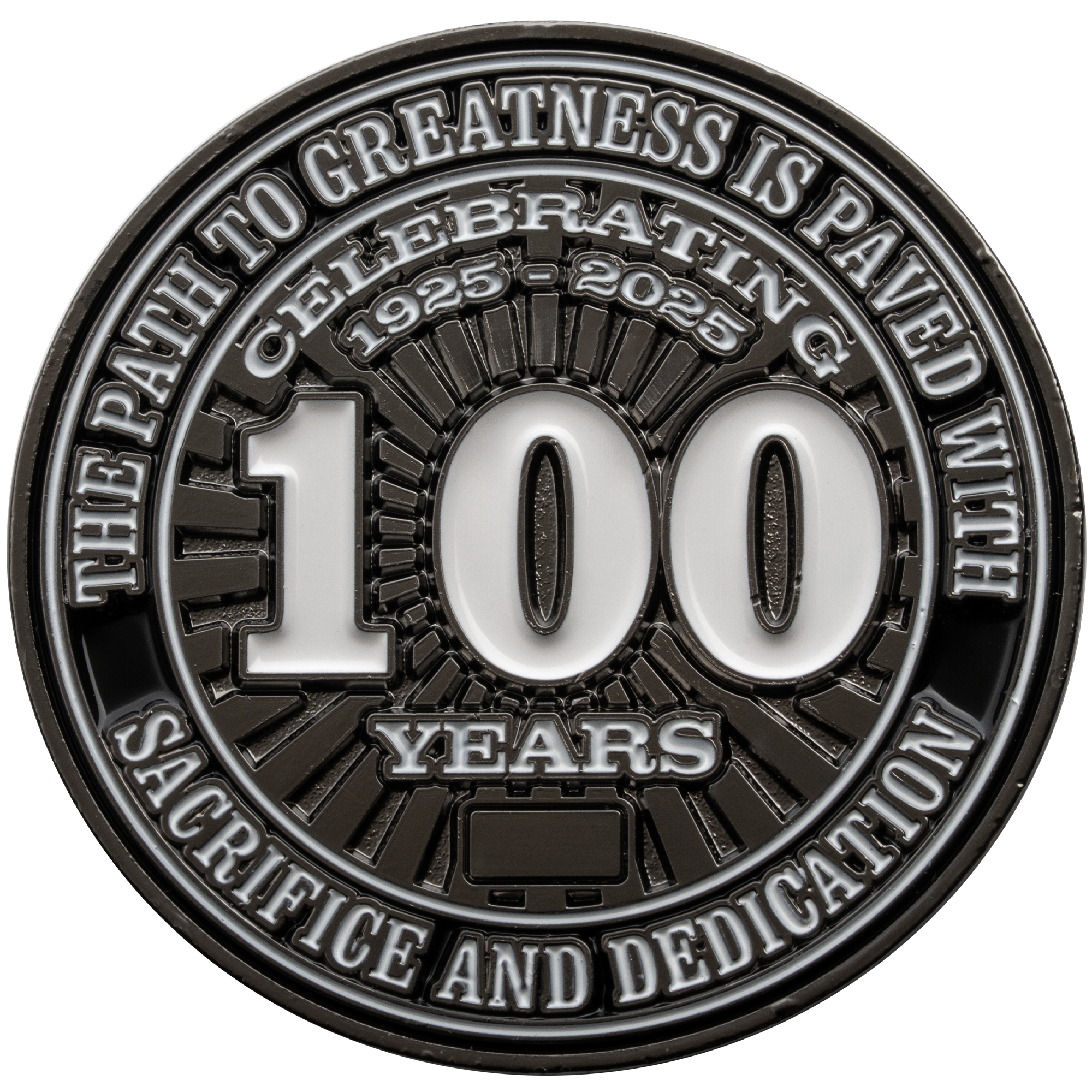 Black and silver challenge coin featuring a large white 100 and the text Celebrating 1925-2025 with sacrifice and dedication.