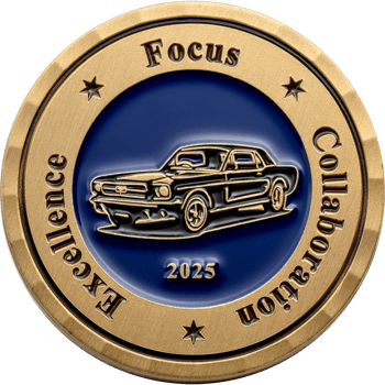 Gold challenge coin featuring a classic sports car on a blue enamel background with the words Focus, Excellence, and Collaboration 2025.