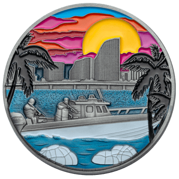Circular challenge coin featuring a colorful sunset over a coastal skyline, palm trees, and tactical personnel on a boat in the water.
