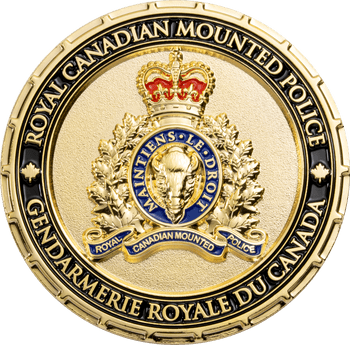 Gold Royal Canadian Mounted Police challenge coin featuring the RCMP crest and bilingual border.