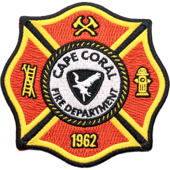 Embroidered Cape Coral Fire Department patch featuring a red Maltese cross, eagle emblem, axes, ladder, and fire hydrant.