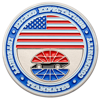 Challenge coin featuring the American flag and a race car silhouette with the words Exceed Expectations, Community, Teammates, and Integrity.