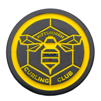 Circular black and yellow PVC challenge coin featuring the Pittsburgh Curling Club logo with a geometric bee design and the text Plan B.