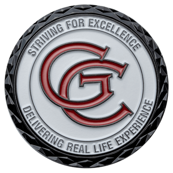 Circular challenge coin with red interlocking CG letters, white background, and black diamond cut edge.
