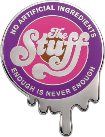 The Stuff movie themed lapel pin featuring pink and purple enamel with dripping white slime design and text reading No Artificial Ingredients.