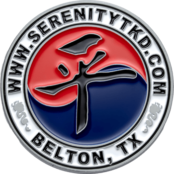 Circular challenge coin for Serenity TKD in Belton TX with a red and blue taegeuk symbol, black calligraphy, and silver dragons.