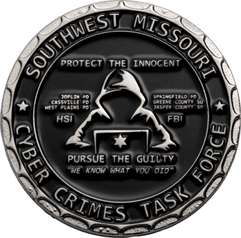 Southwest Missouri Cyber Crimes Task Force challenge coin featuring a hooded figure at a laptop in antique silver finish.