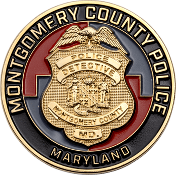 Montgomery County Maryland Police Detective badge challenge coin with gold and enamel detailing.