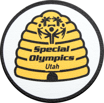 Circular embroidered patch featuring the Special Olympics Utah logo inside a yellow beehive design.