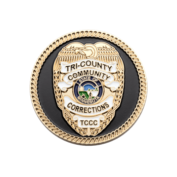 Circular challenge coin featuring a gold eagle badge emblem for Tri-County Community Corrections on a black background with a rope border.