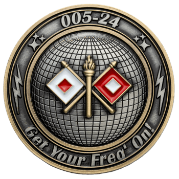 Dual-tone challenge coin featuring a signal corps globe, torch, semaphore flags, and lightning bolts with '005-24' text.