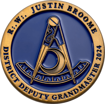 Masonic challenge coin in antique brass and blue enamel featuring Masonic compasses, a crescent moon, and District Deputy Grand Master text.