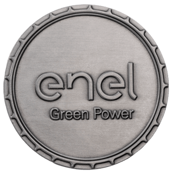 A circular brushed silver medallion featuring the Enel Green Power logo in raised metal text.