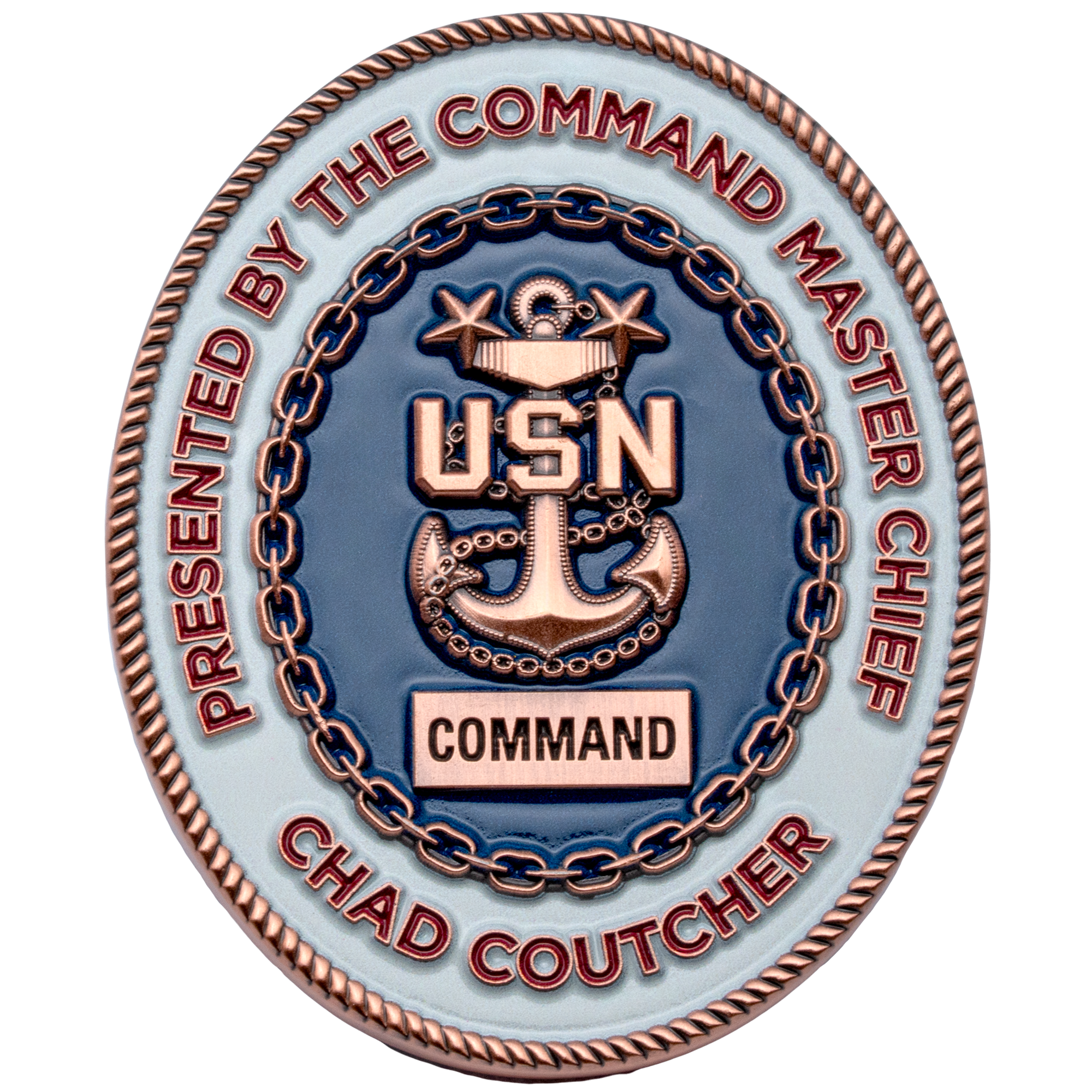 Oval challenge coin with a USN anchor, rope border, and blue and white enamel, presented by Command Master Chief Chad Coutcher.