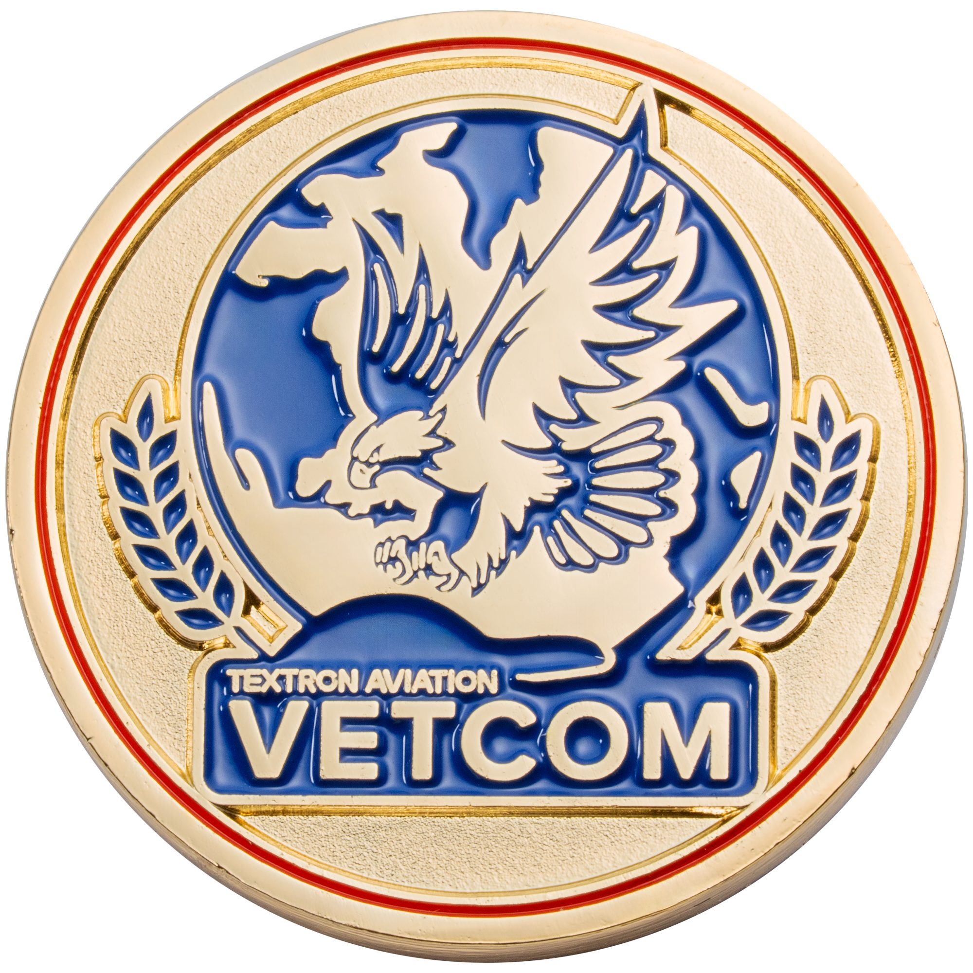 Gold challenge coin with blue enamel featuring an eagle, wheat stalks, and the text Textron Aviation VETCOM.