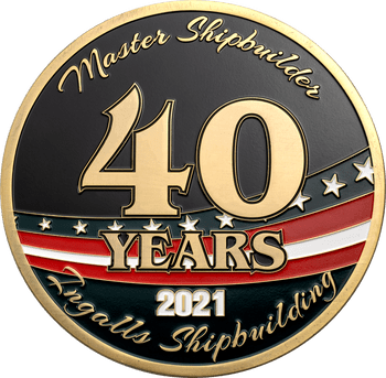 Ingalls Shipbuilding 40 Years Master Shipbuilder challenge coin with gold accents and an American flag banner on black enamel.