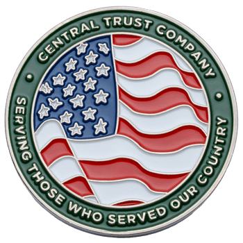 Circular challenge coin featuring the Central Trust Company name and a waving American flag design with a green border.