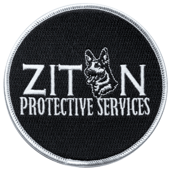 Circular embroidered patch for Ziton Protective Services featuring a German Shepherd head and white text on a black background.