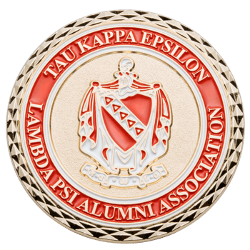 Tau Kappa Epsilon Lambda Psi Alumni Association challenge coin with red and white crest and diamond cut edge.