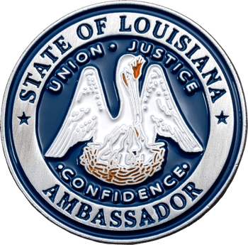 Silver and blue State of Louisiana Confidence Ambassador challenge coin featuring the pelican in her piety emblem