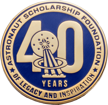 Gold and blue challenge coin for Astronaut Scholarship Foundation featuring a 40 years anniversary design with a star and rocket emblem.