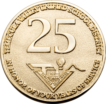 Gold challenge coin for Temecula Valley Unified School District featuring a large 25 and hot air balloon logo in honor of years of service.