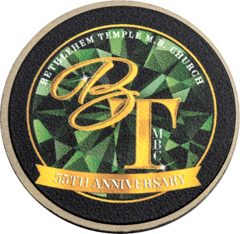 Round challenge coin for Bethlehem Temple M.B. Church 55th Anniversary featuring gold BT initials over a faceted green background.